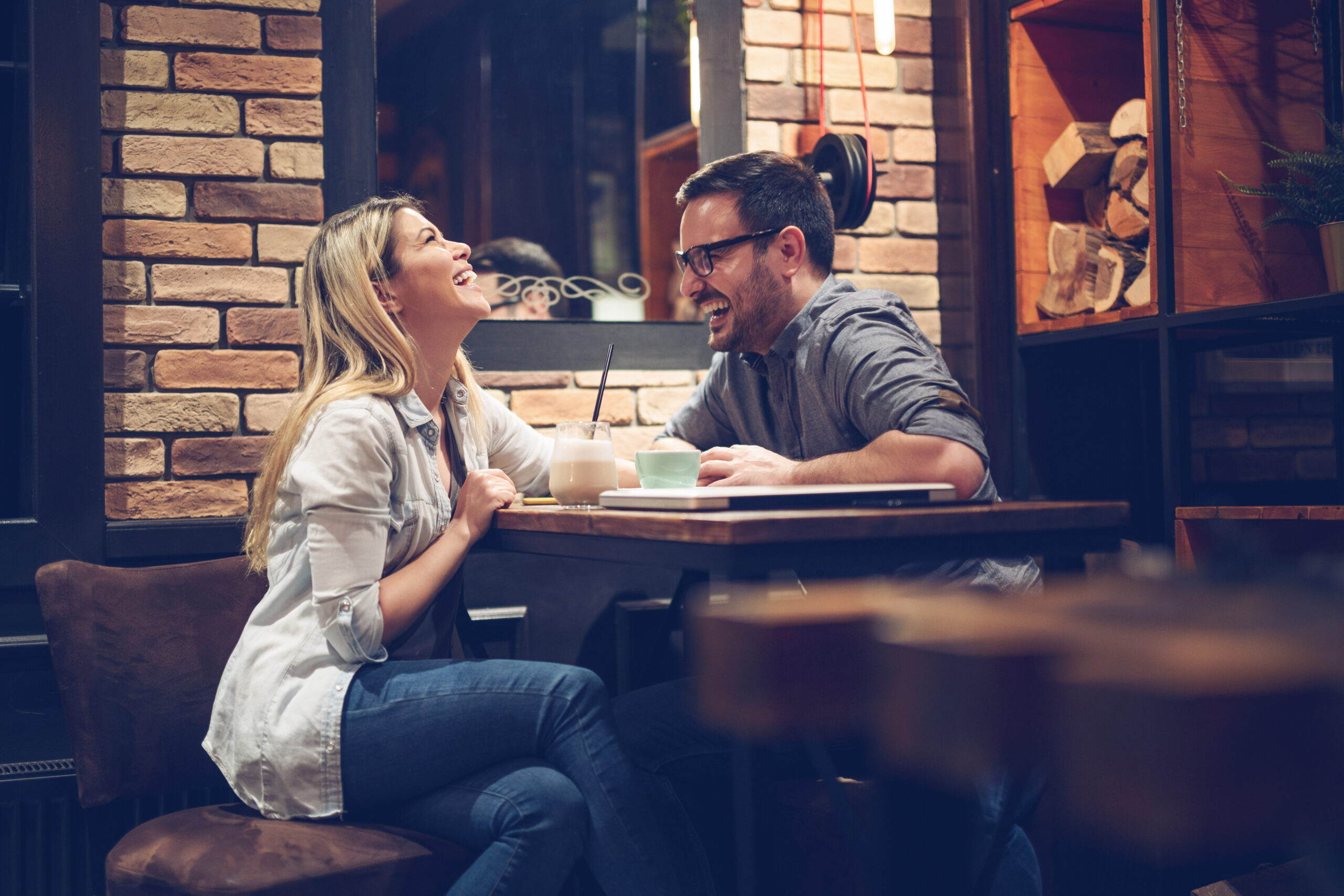 Beautiful couple on a romantic date in cafe - Image